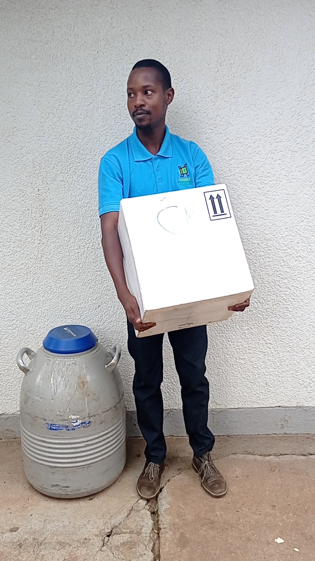 Mambo Medical staff handling cold-chain delivery