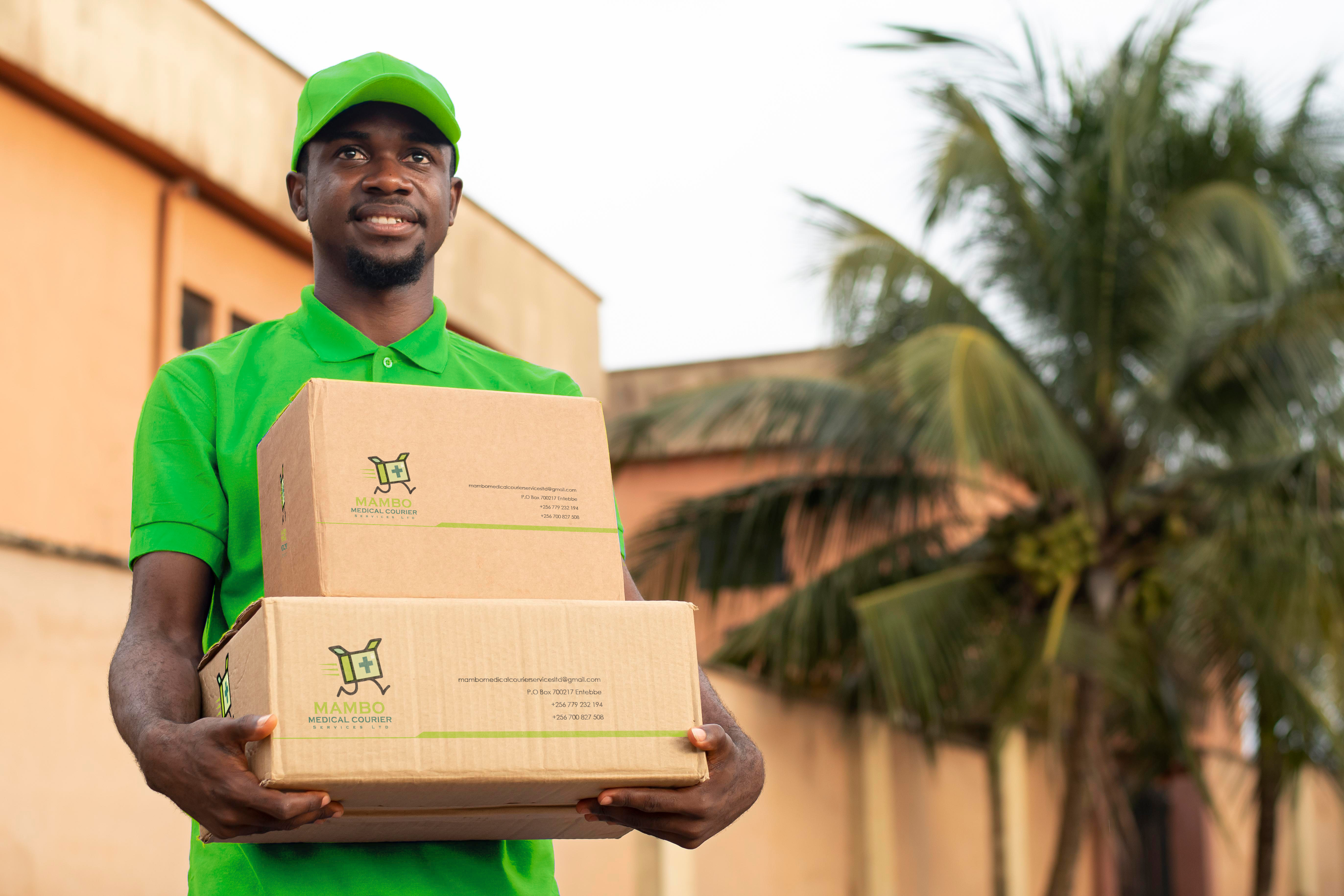 Mambo Medical courier staff with branded packages
